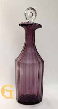 An amethyst facetted decanter